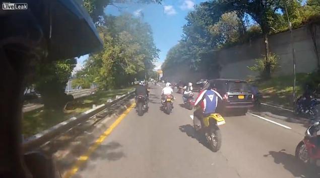 New York City – Motorcyclists Swarm SUV